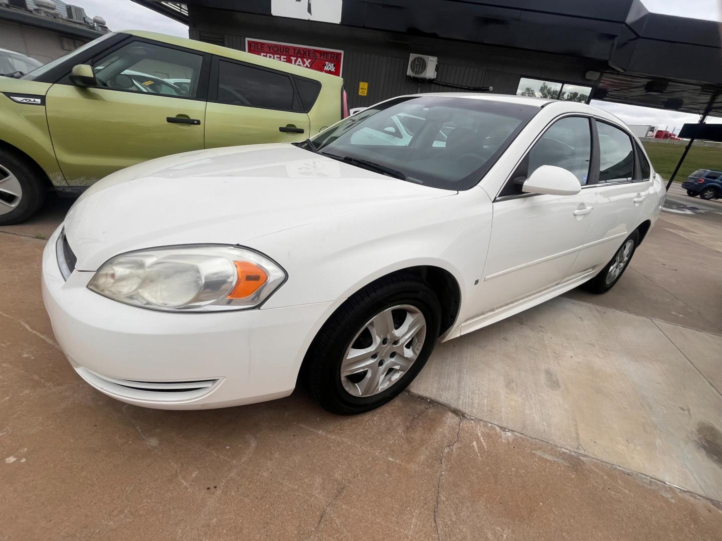 2009 BLACK CHEVROLET IMPALA LS LS (2G1WB57KX91) with an 3.5L V6 OHV 16V FFV engine, 4-Speed Automatic transmission, located at 8101 E. Skelly Dr., Tulsa, OK, 74129, (918) 592-3593, 36.121891, -95.888802 - Photo#0